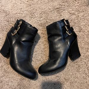 Black leather heeled ankle boots